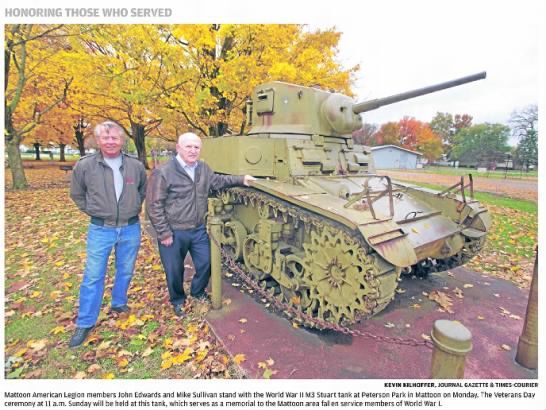 Mattoon American Legion members stand with WWII M3 Stuart Tank